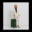 Obrazek Plastový kufr SUITSUIT® Fab Seventies Classic Beetle Green M - zelená - 60 L